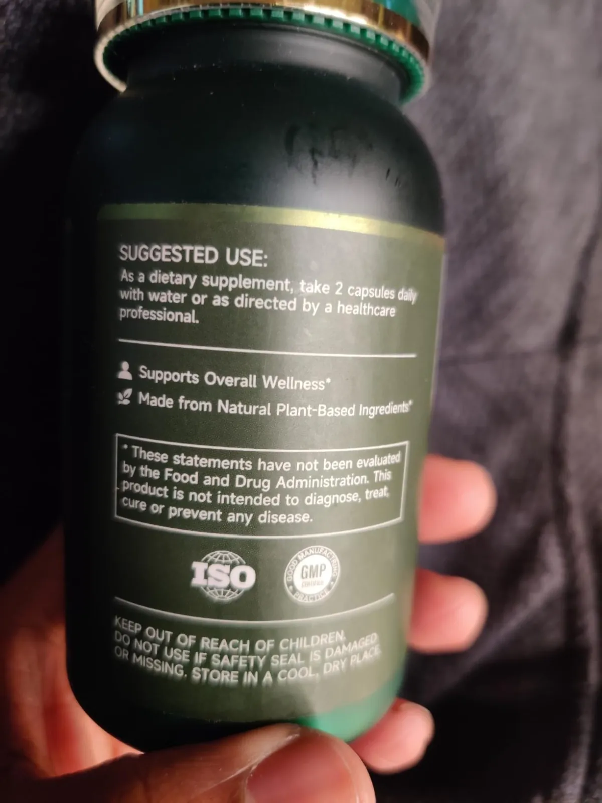 GREENVANTA moringa bottle side label with suggested use: take 2 capsules daily with water, and FDA disclaimer
